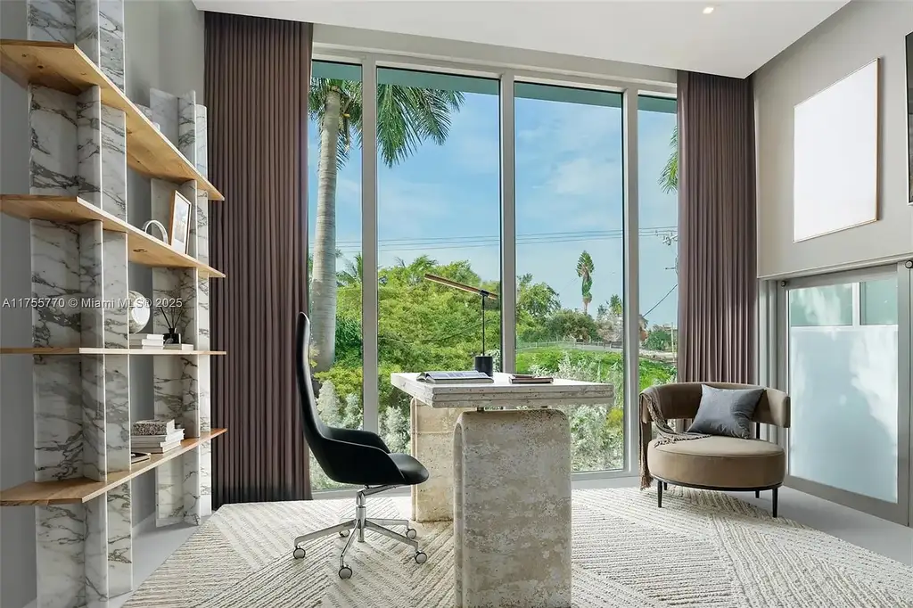 Modern open-concept living room in Miami Beach home for sale with custom stone finishes