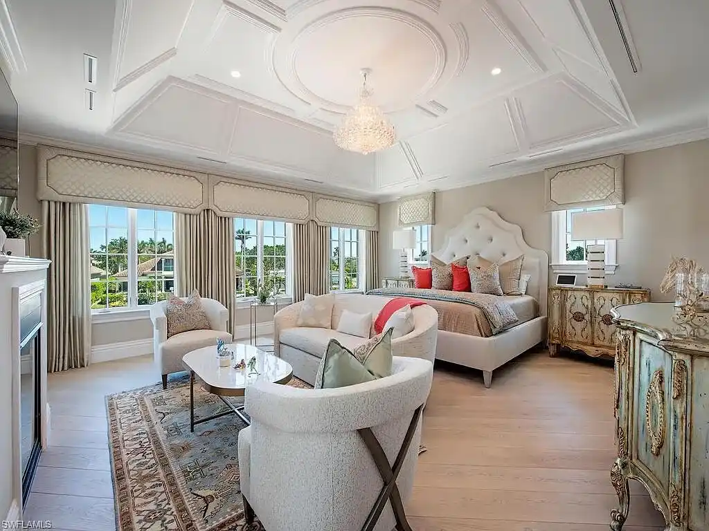 Luxury waterfront estate at 233 Mermaids Bight, featuring panoramic bay views, private dock, and elegant design in Park Shore, Naples.