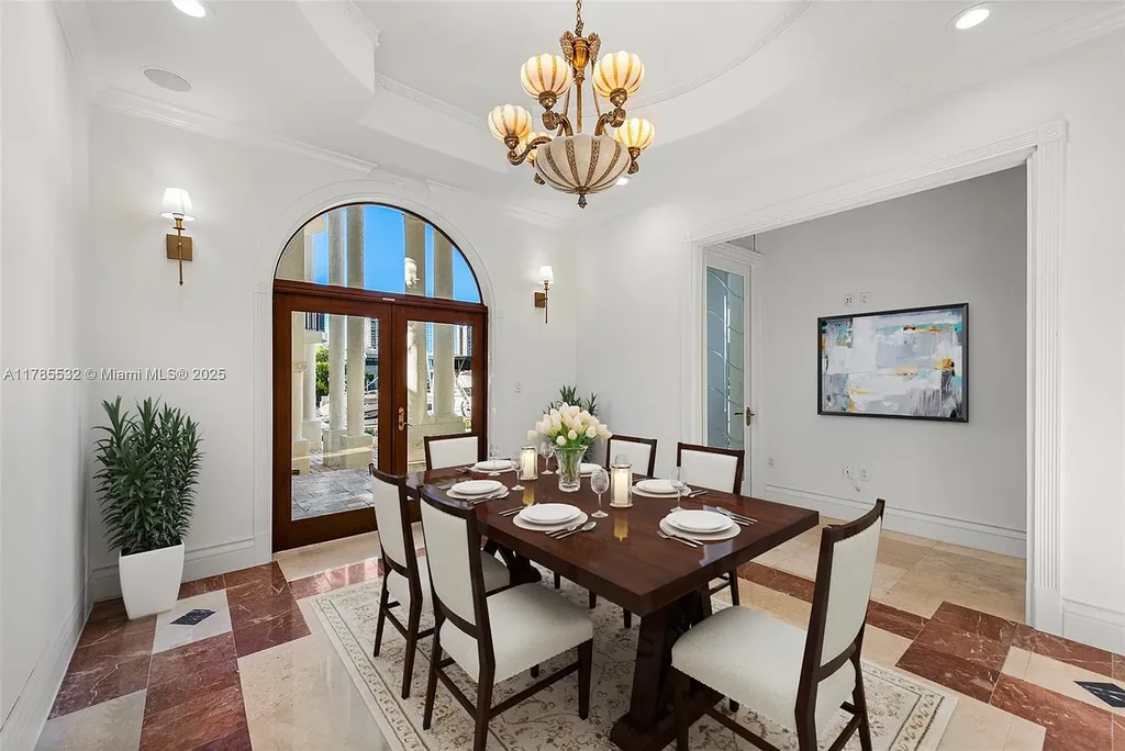 Gourmet kitchen in 270 Atlantic Ave Sunny Isles Beach home with Australian green marble floors and premium appliances