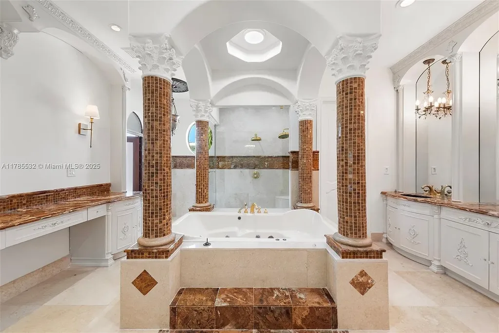 Gourmet kitchen in 270 Atlantic Ave Sunny Isles Beach home with Australian green marble floors and premium appliances
