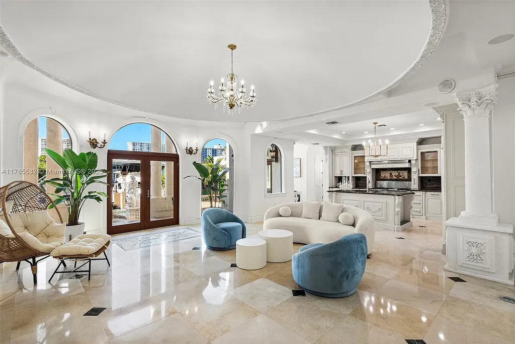 Gourmet kitchen in 270 Atlantic Ave Sunny Isles Beach home with Australian green marble floors and premium appliances