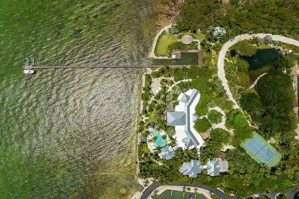 $42M tropical retreat at 88041 Old Hwy featuring lagoon pool and boat basin