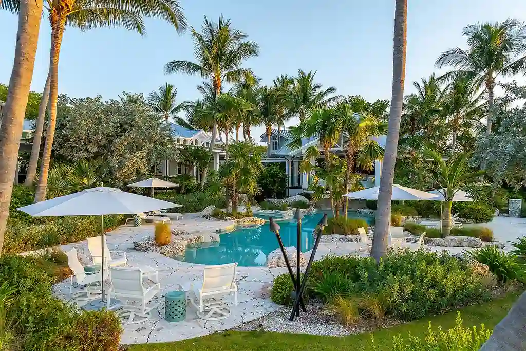 $42M tropical retreat at 88041 Old Hwy featuring lagoon pool and boat basin