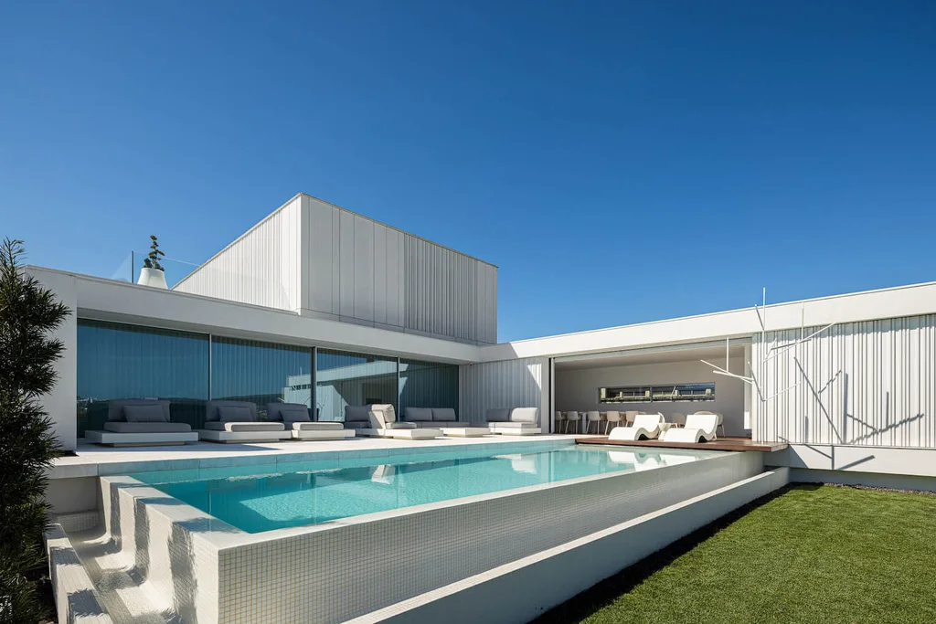 RiscoWhite House by Risco Singular Arquitectura Lda, A Minimalist Concrete Home in Barcelinhos, Portugal