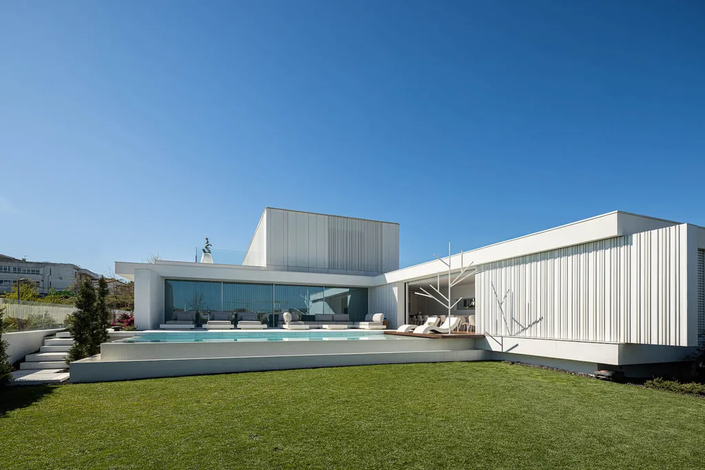 RiscoWhite House by Risco Singular Arquitectura Lda, A Minimalist Concrete Home in Barcelinhos, Portugal