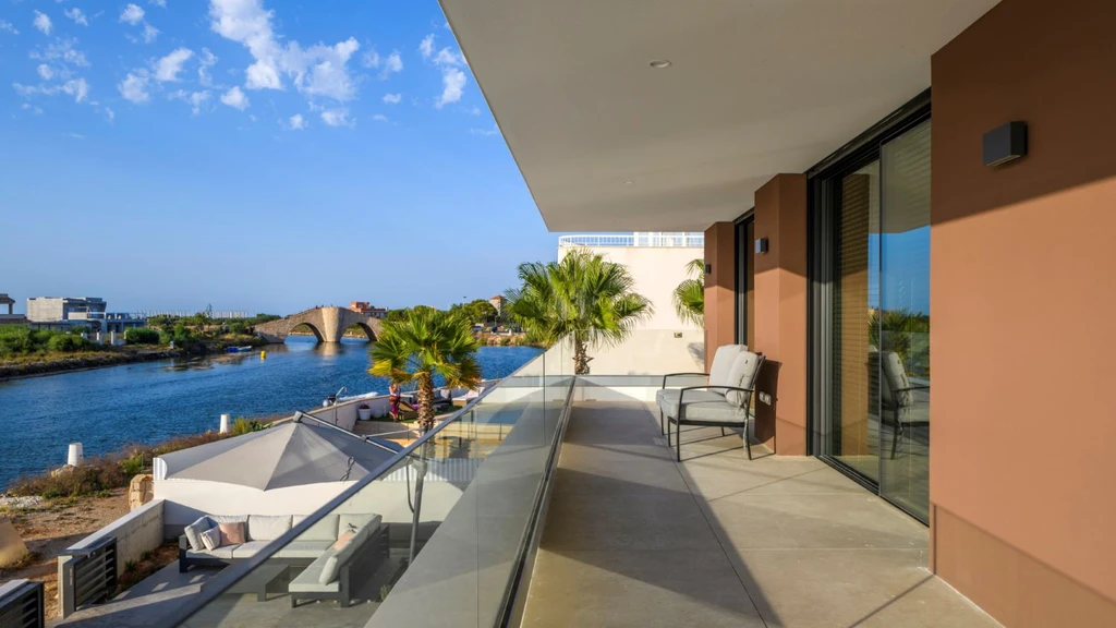 Villa by the water by Albasini Berkhout Architecture SLP Canal Side Serenity in Murcia Spain