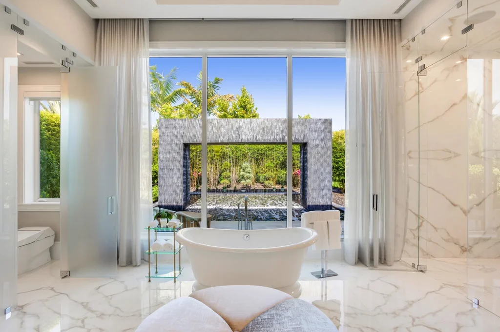 16101 Quiet Vista Circle – Ultra-luxury home in Delray Beach with lake views, saltwater pool, Har-Tru tennis court and double-island kitchen
