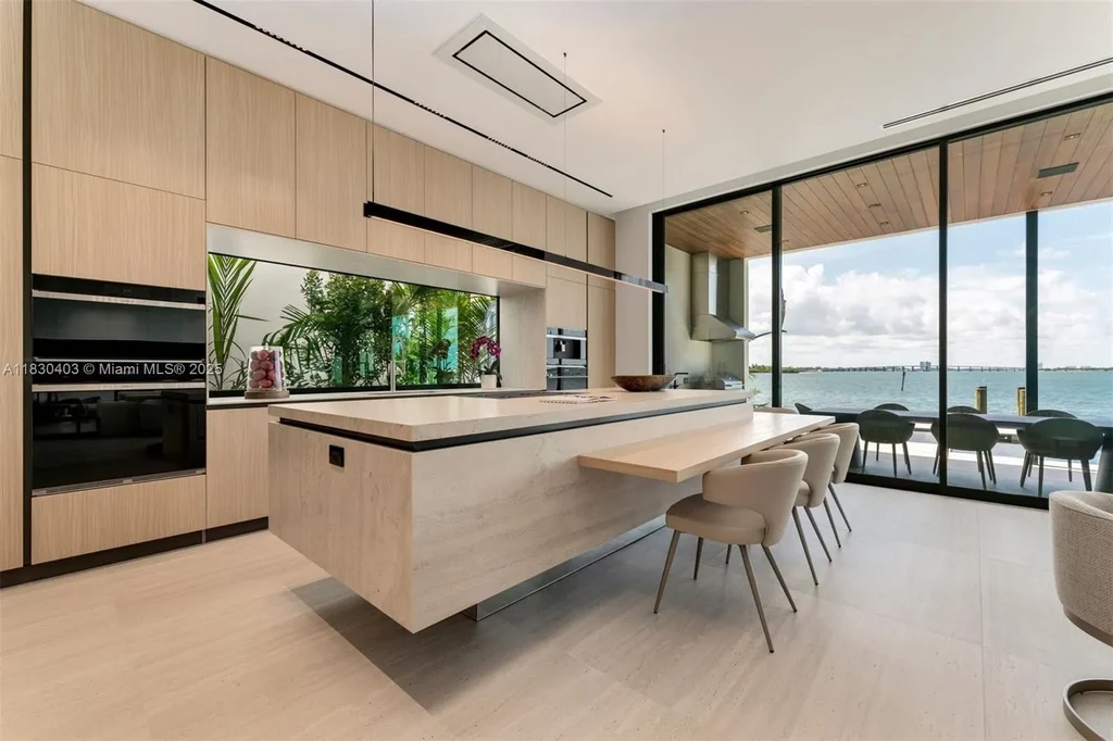 Breathtaking $20 Million Waterfront Masterpiece Redefines Miami Beach Real Estate Luxury 9 Custom Italian kitchen with Wolf appliances in Miami Beach home for sale