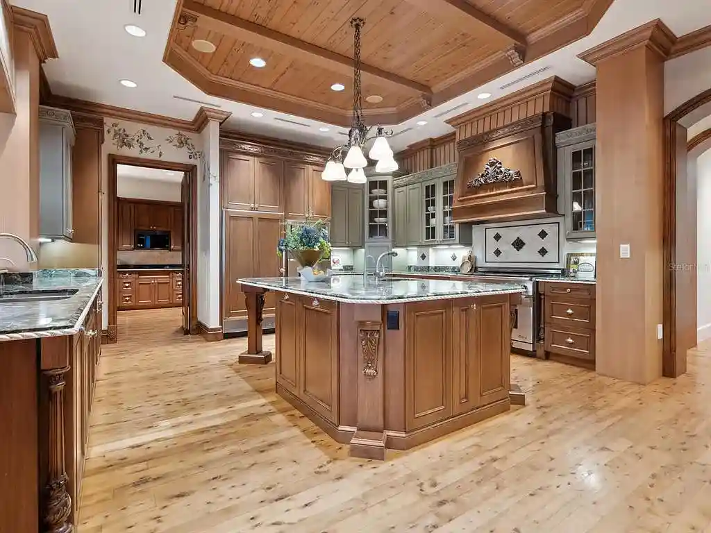 Interior living room of 1423 & 1435 Hillview Ave featuring coffered ceilings and stone fireplace