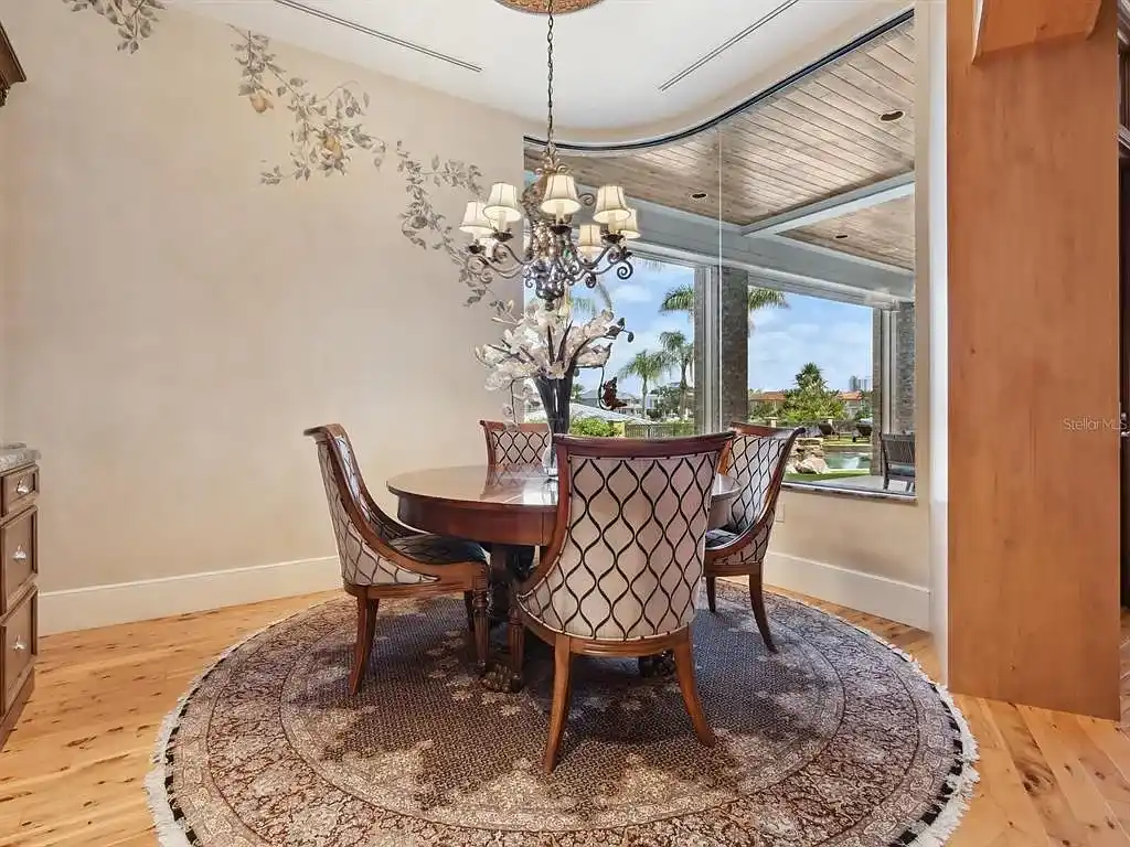Interior living room of 1423 & 1435 Hillview Ave featuring coffered ceilings and stone fireplace