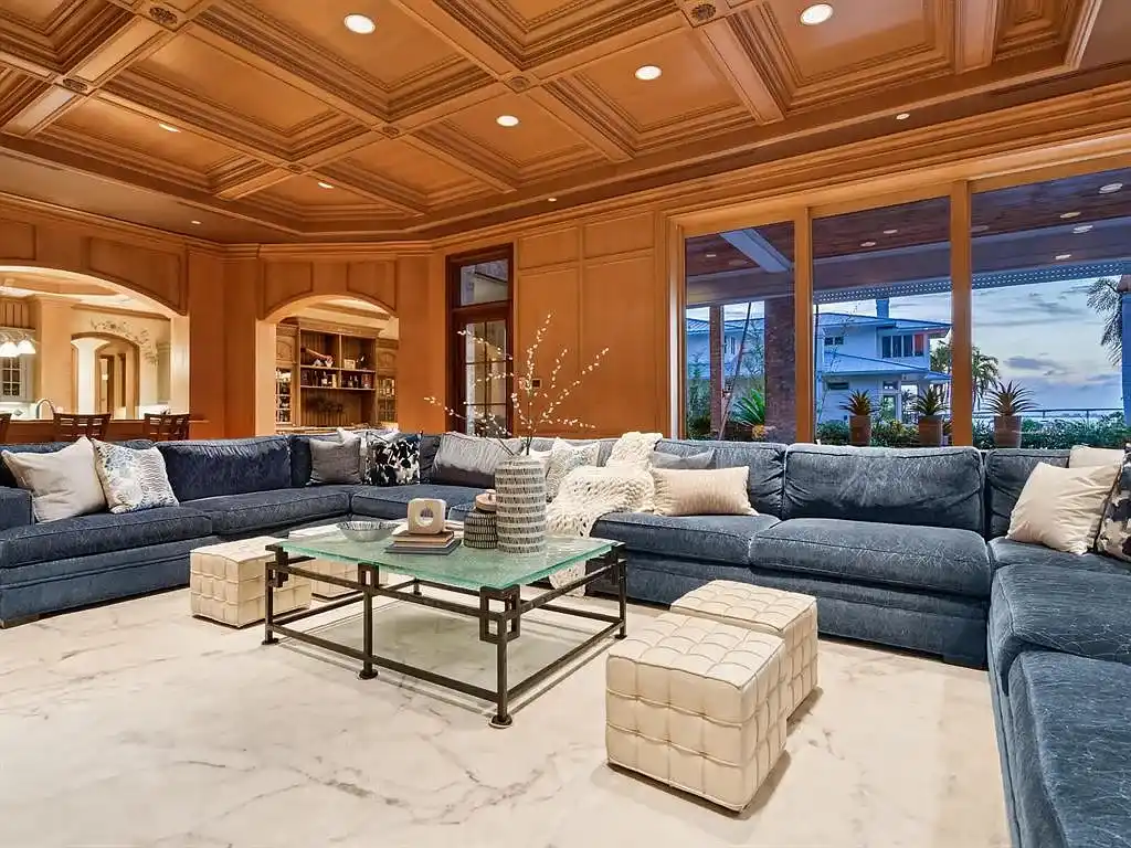 Interior living room of 1423 & 1435 Hillview Ave featuring coffered ceilings and stone fireplace