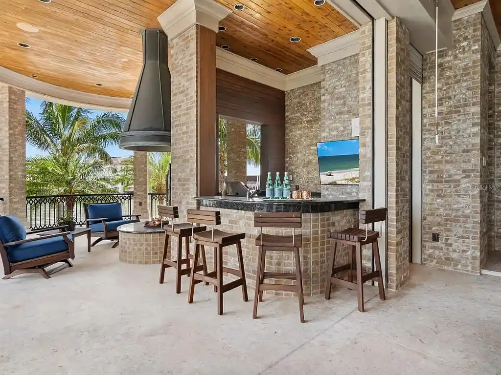Interior living room of 1423 & 1435 Hillview Ave featuring coffered ceilings and stone fireplace
