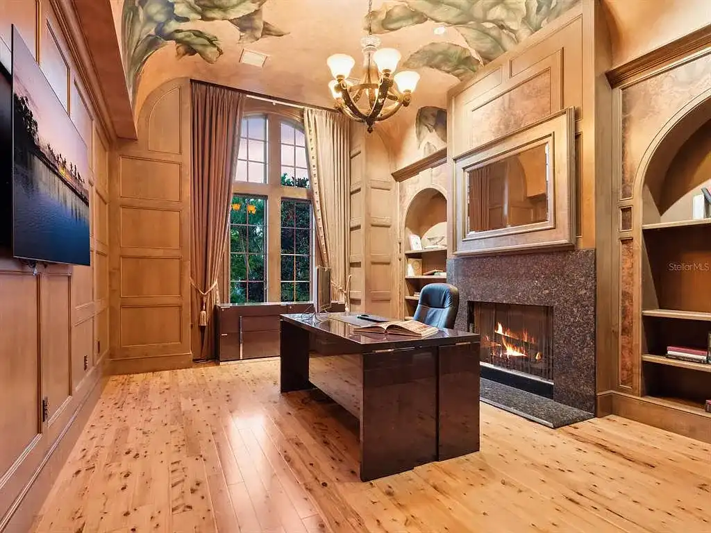 Interior living room of 1423 & 1435 Hillview Ave featuring coffered ceilings and stone fireplace