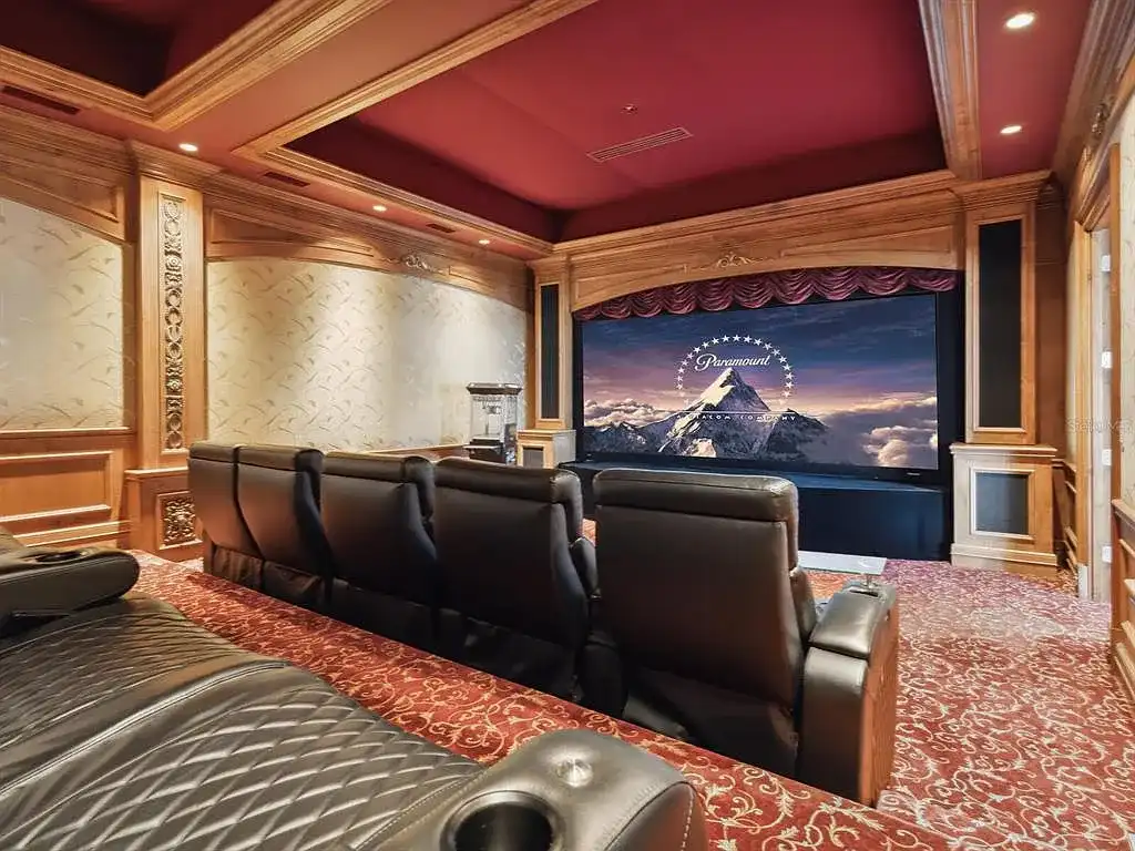 Interior living room of 1423 & 1435 Hillview Ave featuring coffered ceilings and stone fireplace