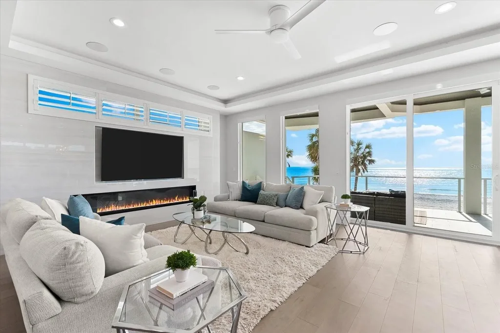 32 Gulf Blvd luxury beachfront estate in Indian Rocks Beach, FL featuring dual water frontage, modern coastal design, and private dock