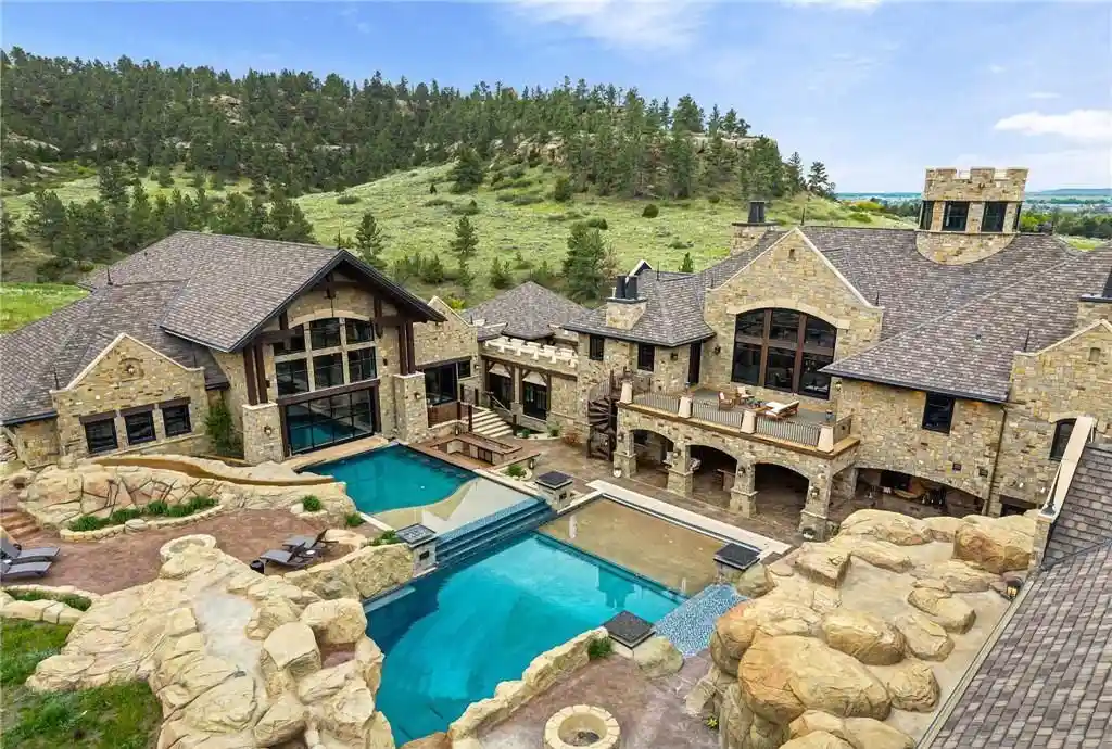 Iconic Montana Chateau at 5650 Canyonwoods Dr Offers Breathtaking Views and Timeless Elegance for 26 1