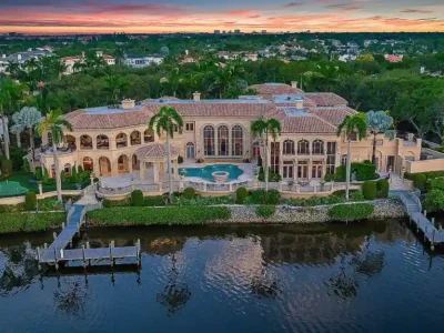 $30,000,000 Waterfront Paradise in Jupiter Offers Private Docks, Lavish Interiors, and Resort Amenities 1 209 Commodore Drive Jupiter FL Estate Listed for 40M Offers Unrivaled Waterfront Luxury 1