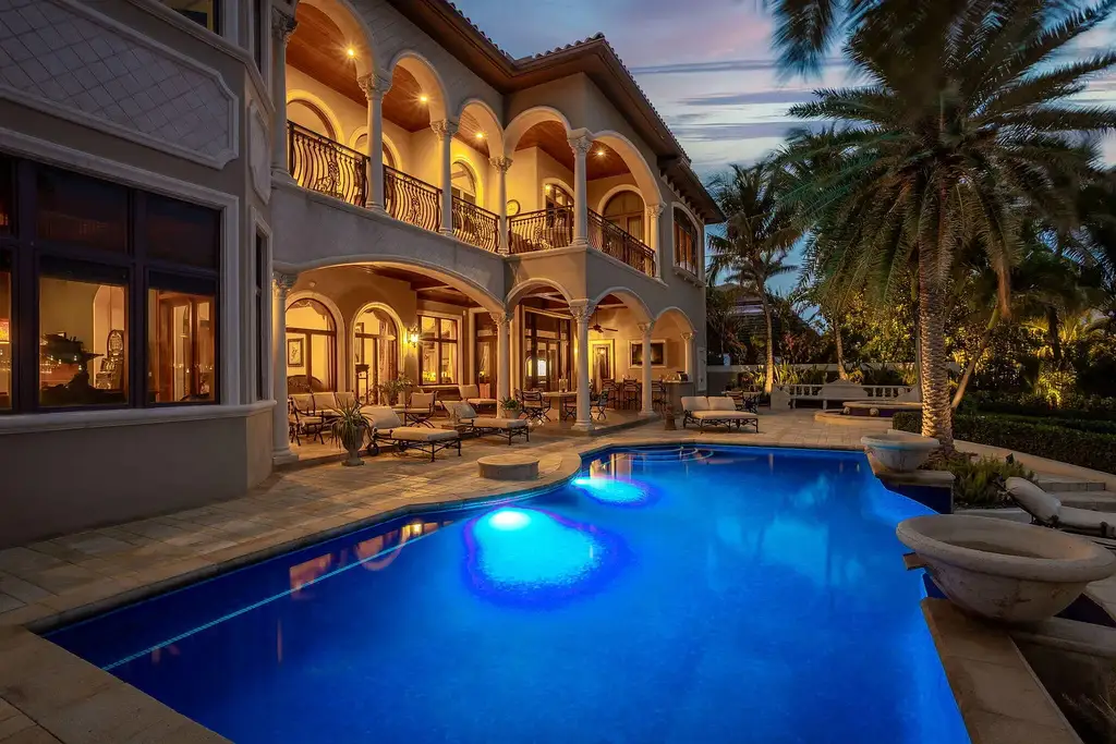 Luxury waterfront estate at 3870 NE 31st Avenue in Lighthouse Point with private dock, pool, and Mediterranean architecture
