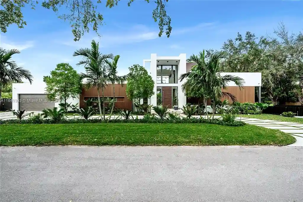 967 NE 117th St Listed for 5.7M Turnkey Tropical Modern Estate with Rooftop Pool and Privacy in Biscayne Park 1
