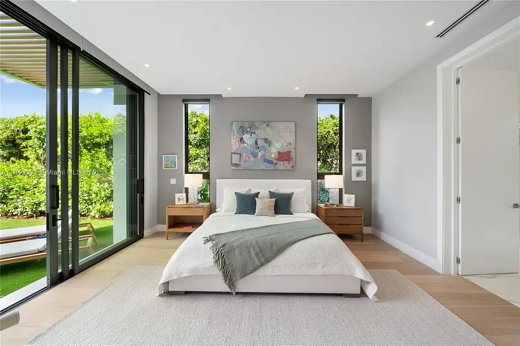 967 NE 117th St Listed for 5.7M Turnkey Tropical Modern Estate with Rooftop Pool and Privacy in Biscayne Park 11