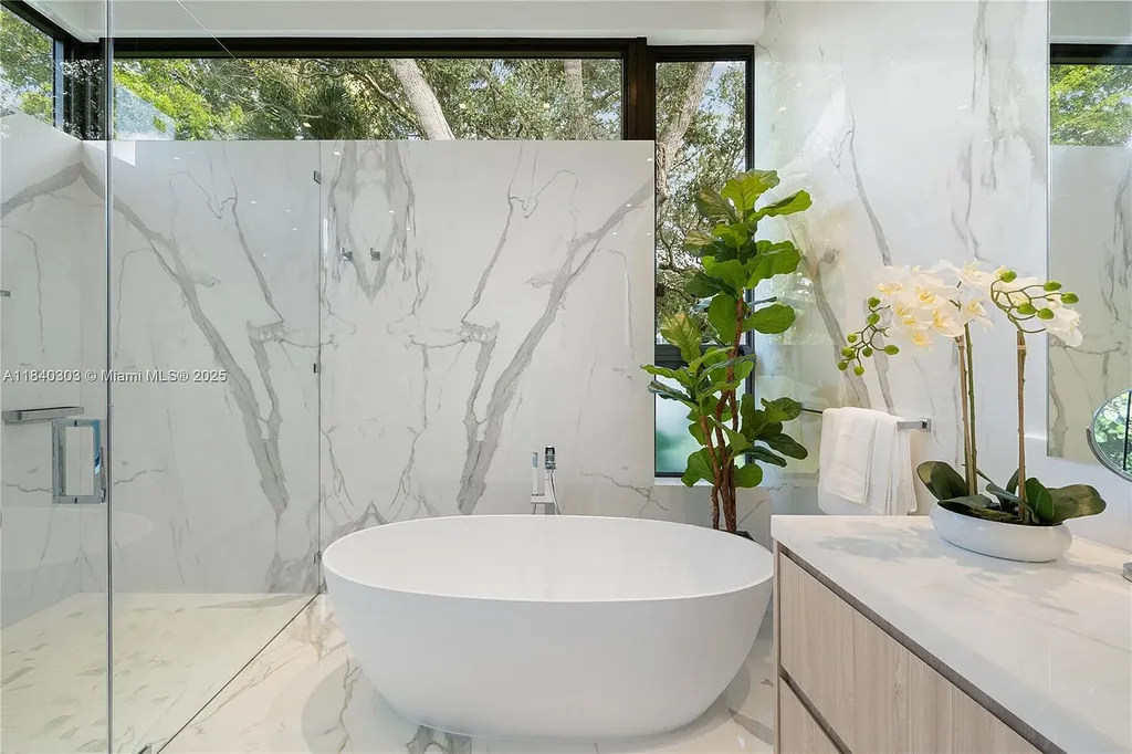 967 NE 117th St Listed for 5.7M Turnkey Tropical Modern Estate with Rooftop Pool and Privacy in Biscayne Park 2