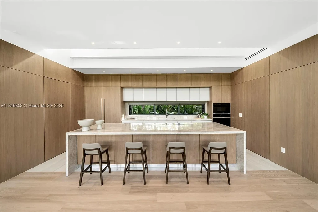 967 NE 117th St Listed for 5.7M Turnkey Tropical Modern Estate with Rooftop Pool and Privacy in Biscayne Park 6
