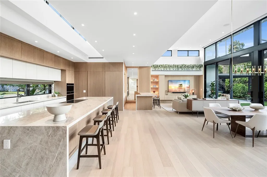 967 NE 117th St Listed for 5.7M Turnkey Tropical Modern Estate with Rooftop Pool and Privacy in Biscayne Park 9