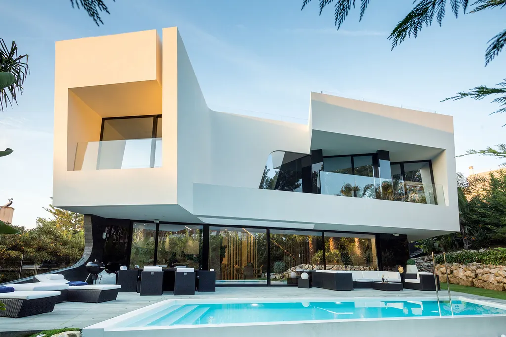House in Costa Brava by A-cero Architects, Curves and Light Define This Sculptural House