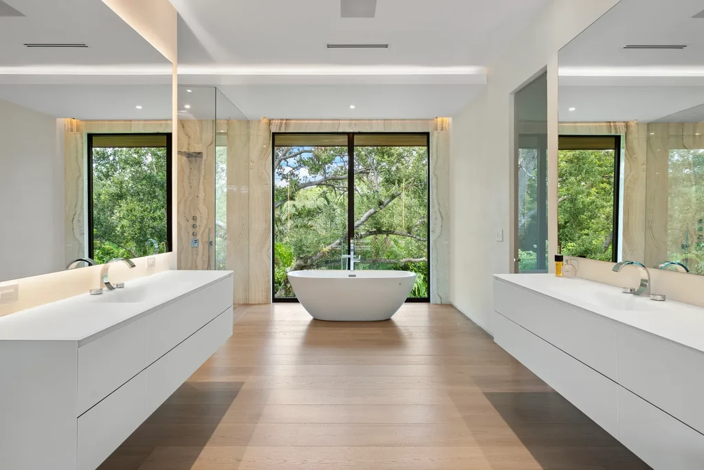 10840 Old Cutler Rd Coral Gables luxury estate with modern architecture by Giorgio Balli, surrounded by oak trees in Snapper Creek Lakes