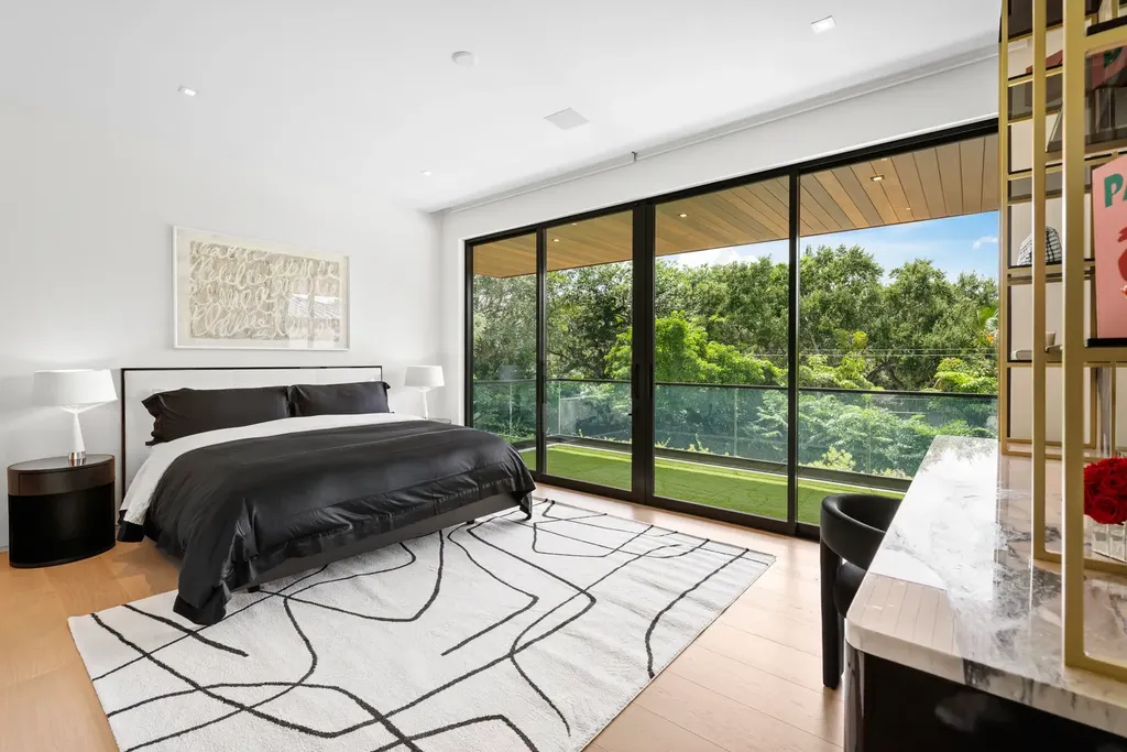 10840 Old Cutler Rd Coral Gables luxury estate with modern architecture by Giorgio Balli, surrounded by oak trees in Snapper Creek Lakes