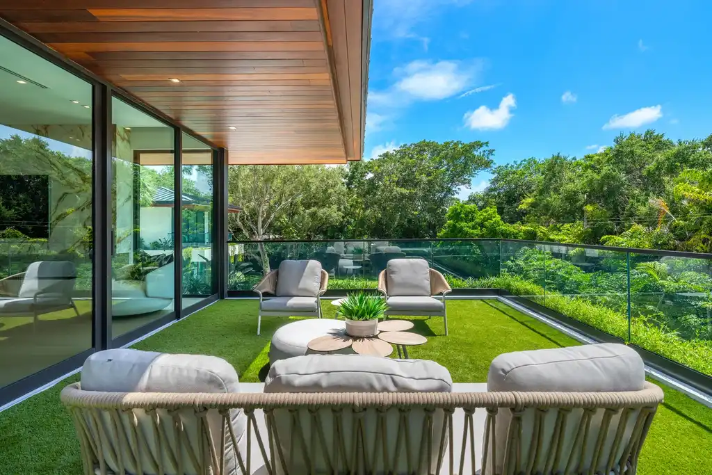 10840 Old Cutler Rd Coral Gables luxury estate with modern architecture by Giorgio Balli, surrounded by oak trees in Snapper Creek Lakes