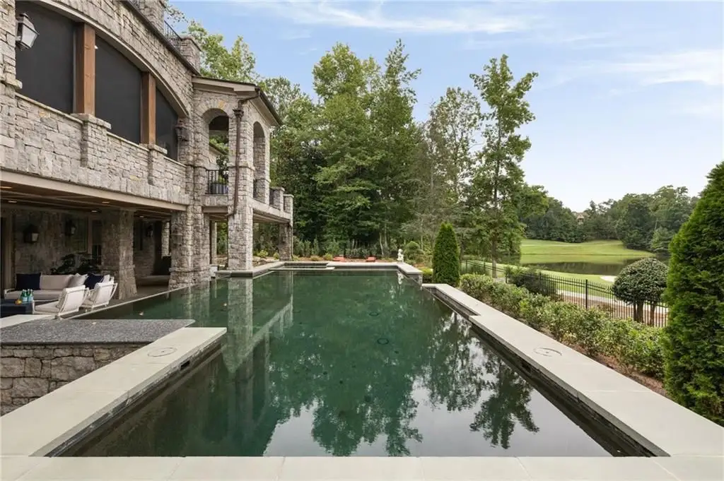 Discover The Castle at 929 Middle Fork Trl An Extraordinary 3.875M Italian Limestone Estate in Georgia 16
