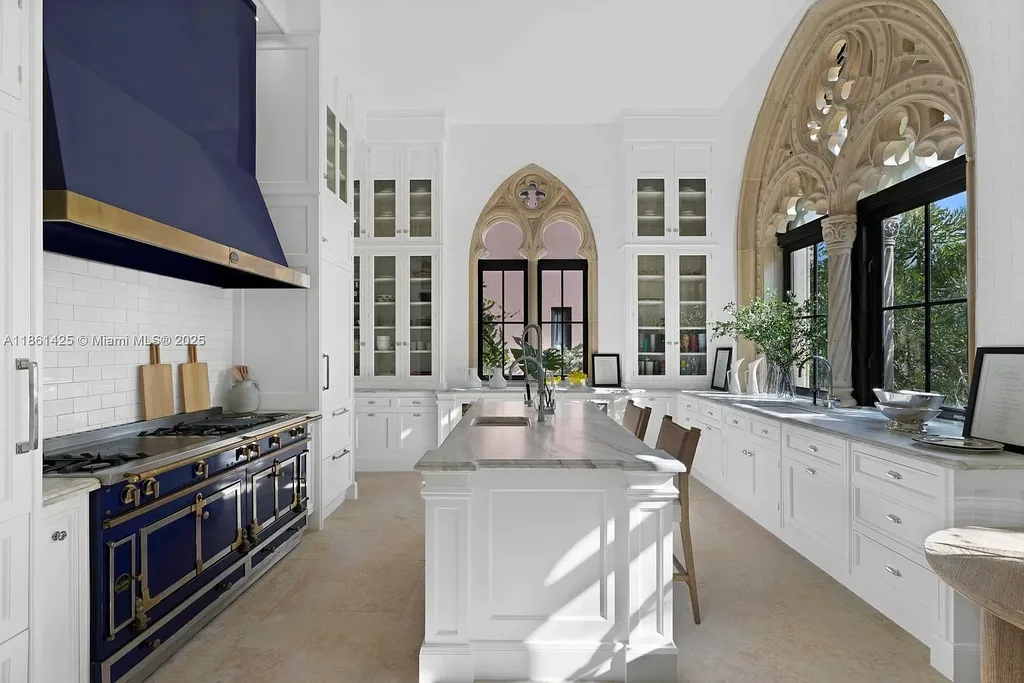 Luxury waterfront estate at 1840 S Bayshore Ln Miami, a $24 million Coconut Grove home for sale with Gothic design, infinity pool, and bay views.