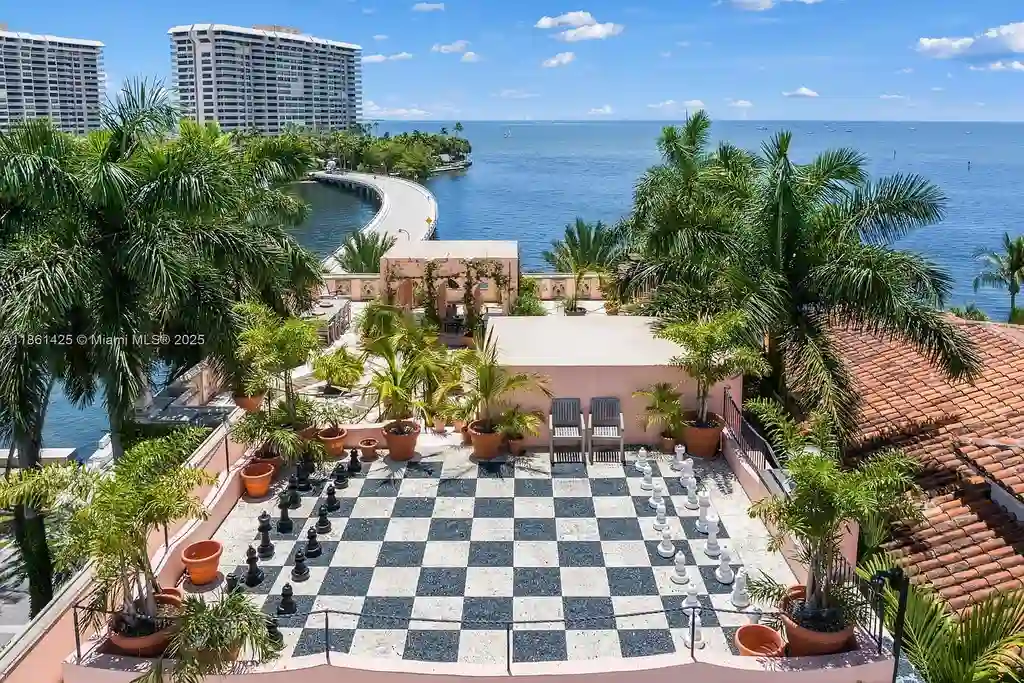Luxury waterfront estate at 1840 S Bayshore Ln Miami, a $24 million Coconut Grove home for sale with Gothic design, infinity pool, and bay views.