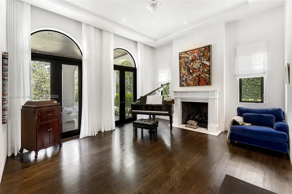 Luxury Mediterranean waterfront estate at 231 Costanera Road Coral Gables with private dock, $11.98M home featuring pool, lush landscaping, and elegant design