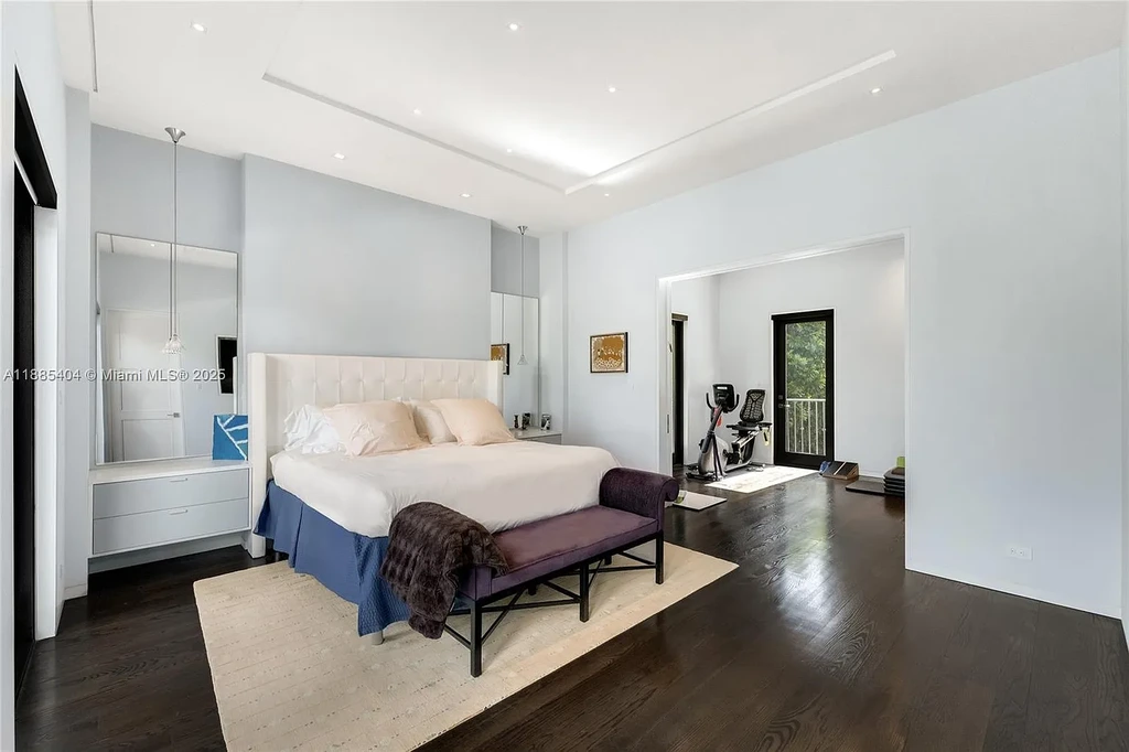 Luxury Mediterranean waterfront estate at 231 Costanera Road Coral Gables with private dock, $11.98M home featuring pool, lush landscaping, and elegant design