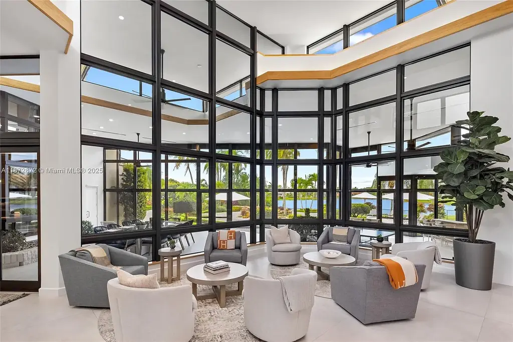 2965 Surrey Ln Weston FL – $11M waterfront luxury home for sale with modern design, spacious interiors, and prime Weston real estate location