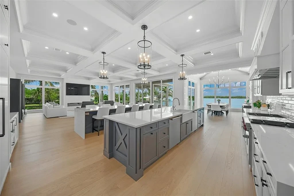 612 Juan Anasco Dr Longboat Key waterfront home for sale – $24M British West Indies estate with 6 bedrooms, 9 baths, 9,243 sq ft, private boat lifts, heated pool, and panoramic Gulf views