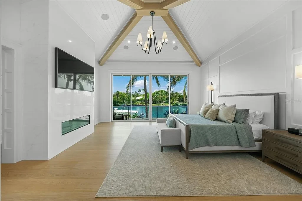 612 Juan Anasco Dr Longboat Key waterfront home for sale – $24M British West Indies estate with 6 bedrooms, 9 baths, 9,243 sq ft, private boat lifts, heated pool, and panoramic Gulf views