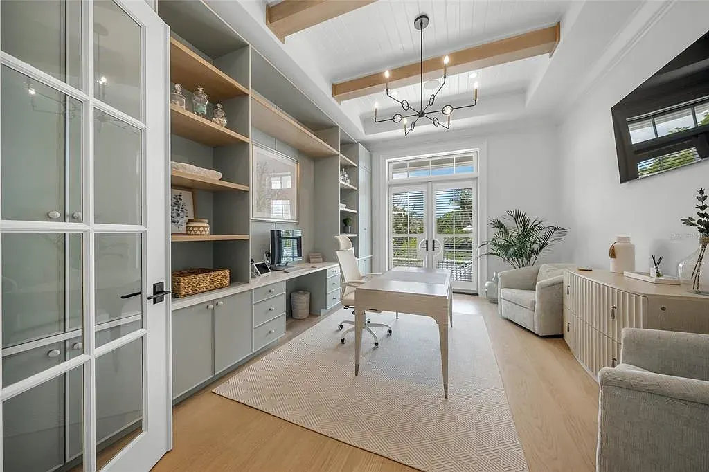 612 Juan Anasco Dr Longboat Key waterfront home for sale – $24M British West Indies estate with 6 bedrooms, 9 baths, 9,243 sq ft, private boat lifts, heated pool, and panoramic Gulf views