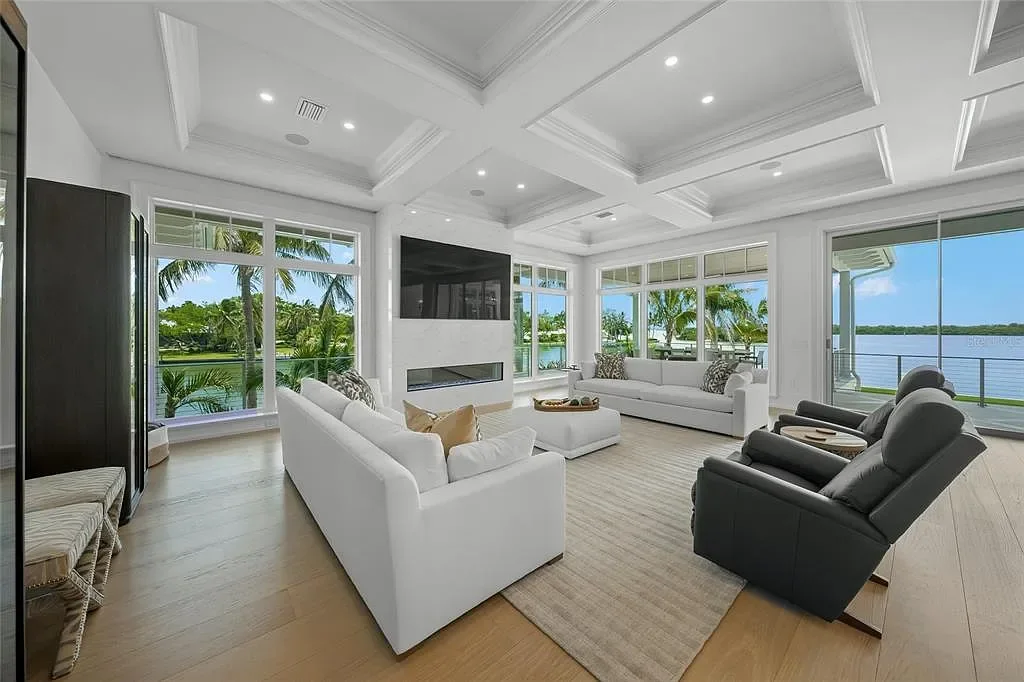612 Juan Anasco Dr Longboat Key waterfront home for sale – $24M British West Indies estate with 6 bedrooms, 9 baths, 9,243 sq ft, private boat lifts, heated pool, and panoramic Gulf views
