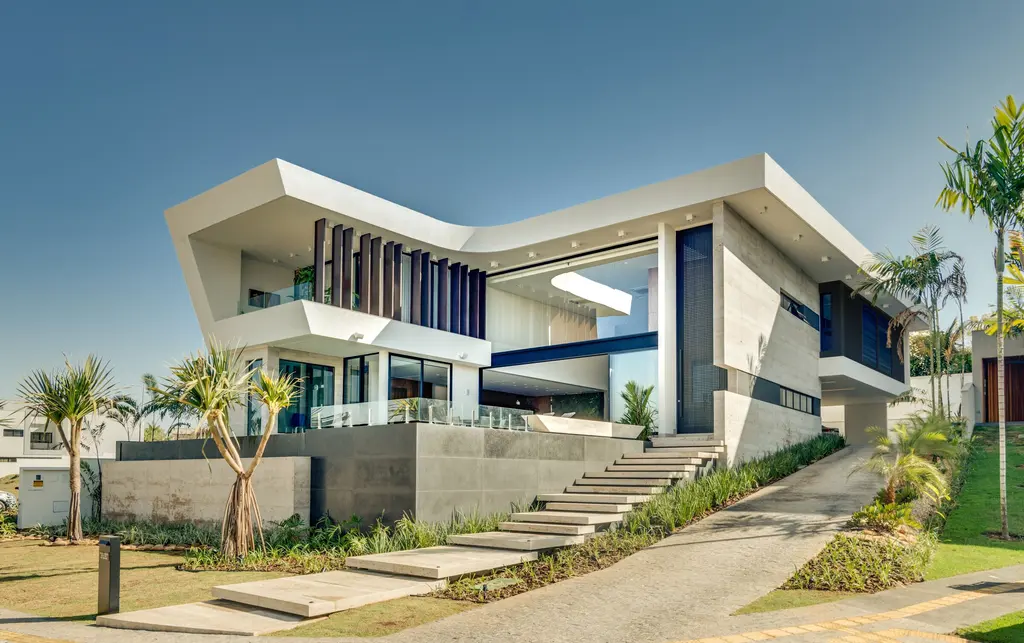 RL House by Sayala e Rafael Arquitetos Associados Overlapping Volumes and Social Connection 10