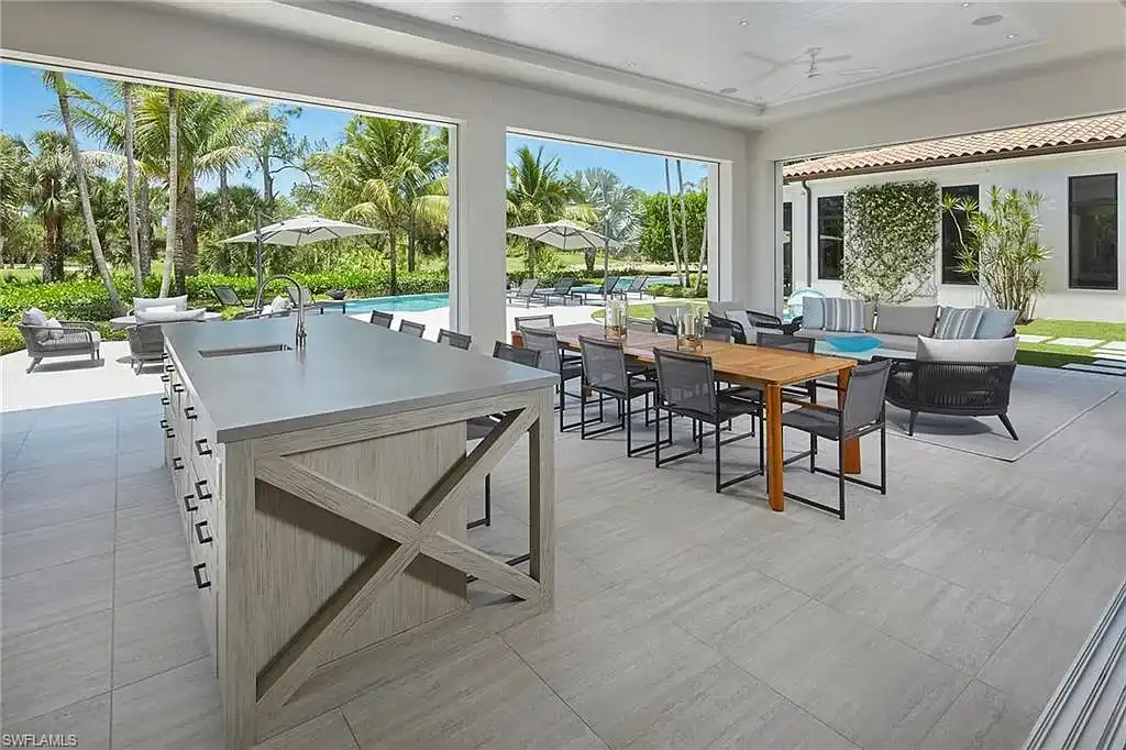Modern kitchen interior with Caesarstone island in 16945 Sud Cortile CT