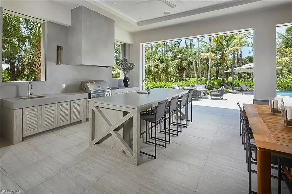 Modern kitchen interior with Caesarstone island in 16945 Sud Cortile CT