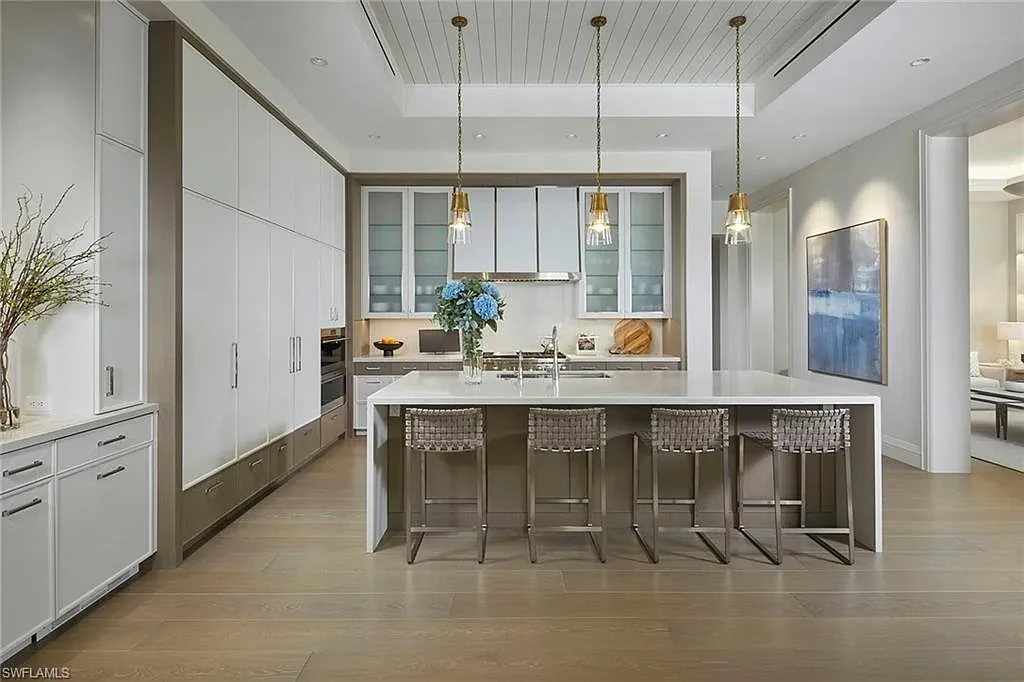 Modern kitchen interior with Caesarstone island in 16945 Sud Cortile CT