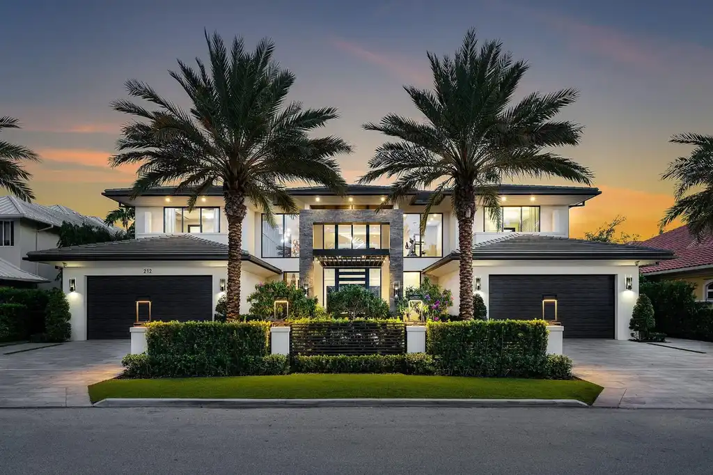 Stunning exterior view of 1492 Hunter Dr luxury home in Brentwood showcasing elegant architecture, landscaped grounds, and sunset lighting.