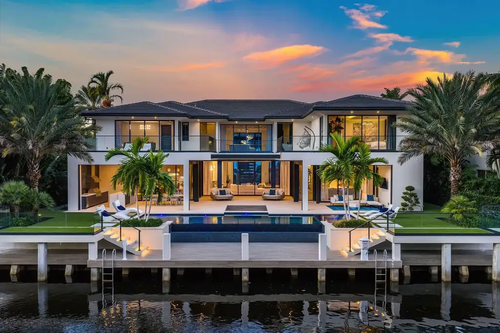 Stunning exterior view of 1492 Hunter Dr luxury home in Brentwood showcasing elegant architecture, landscaped grounds, and sunset lighting.