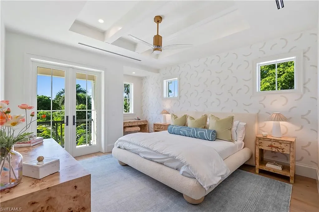 Luxury coastal home at 285 Central AVE Naples FL with pool, outdoor kitchen, and elegant modern interiors.