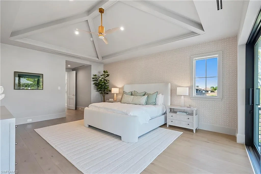 Luxury coastal home at 285 Central AVE Naples FL with pool, outdoor kitchen, and elegant modern interiors.