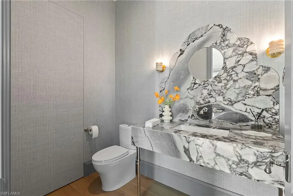 Luxury coastal home at 285 Central AVE Naples FL with pool, outdoor kitchen, and elegant modern interiors.